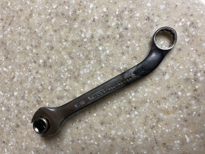 Custom cylinder base nut wrench. The socket is welded into the open end which allows the wrench to be used with a ratchet  and an extension of a torque wrench for torquing all from the top of the cylinder.