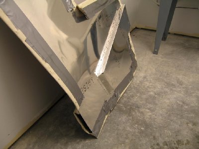 New aluminum side panel with integral heat duct